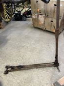 2 wooden cart jacks and a metal trolley jack