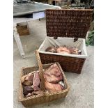 Display cuts of meat in 2 wicker containers. This lot carries VAT.