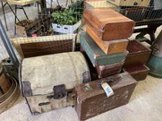 Wicker dome top trunk together with 6 leather suitcases