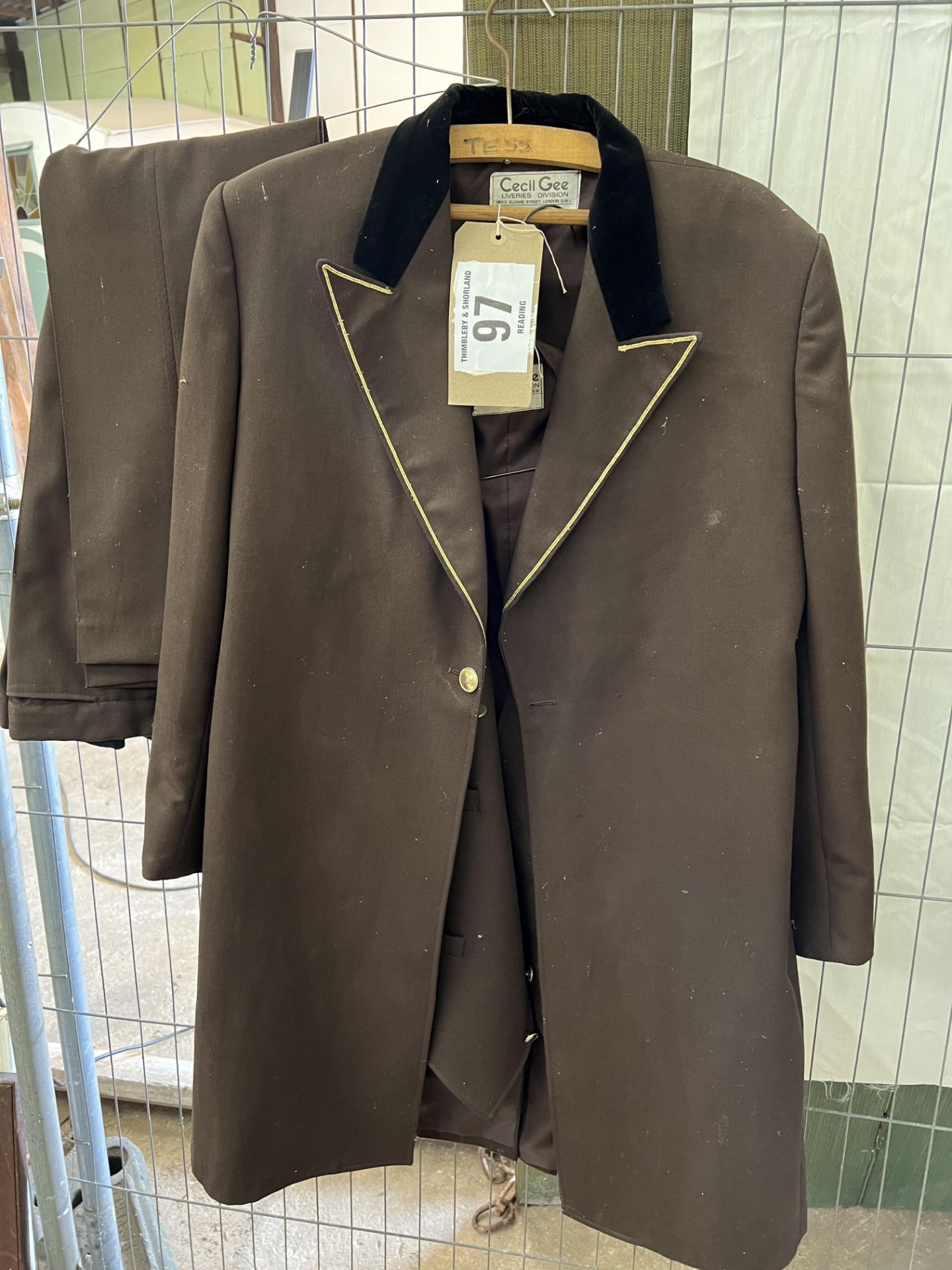 A brown livery suit by Cecil Gee