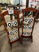A pair of wooden score stands. This lot carries VAT.