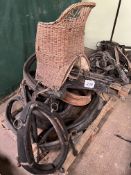 Qty of collars and a wicker child's saddle