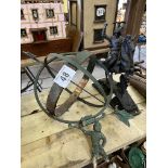 An armillary/sundial and a metal figure of a warrior on horseback. This lot carries VAT.