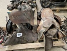 Six old riding saddles and a qty of tack