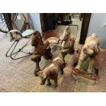 Five child's toy horses