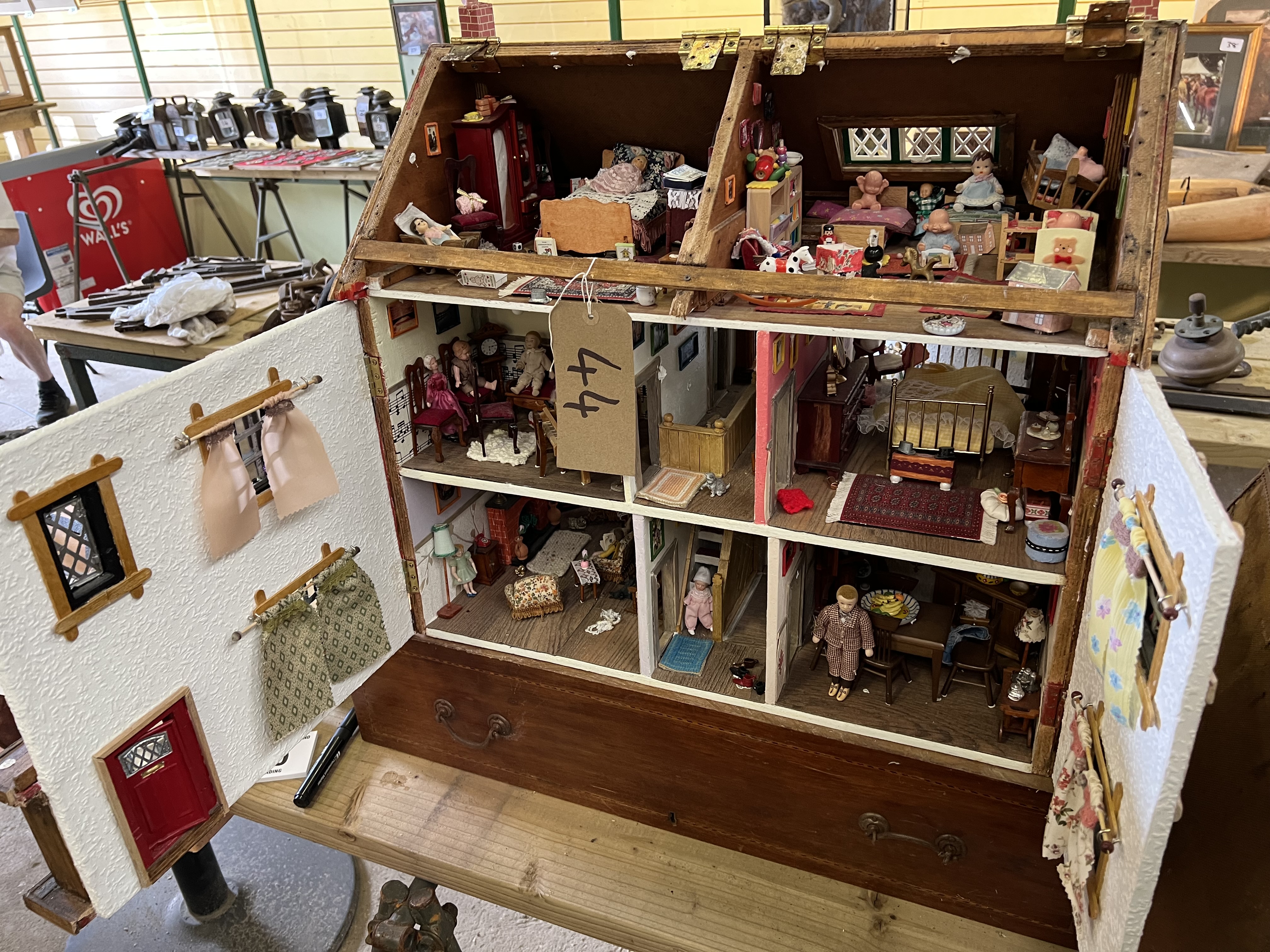 Two dolls' houses. This lot carries VAT.