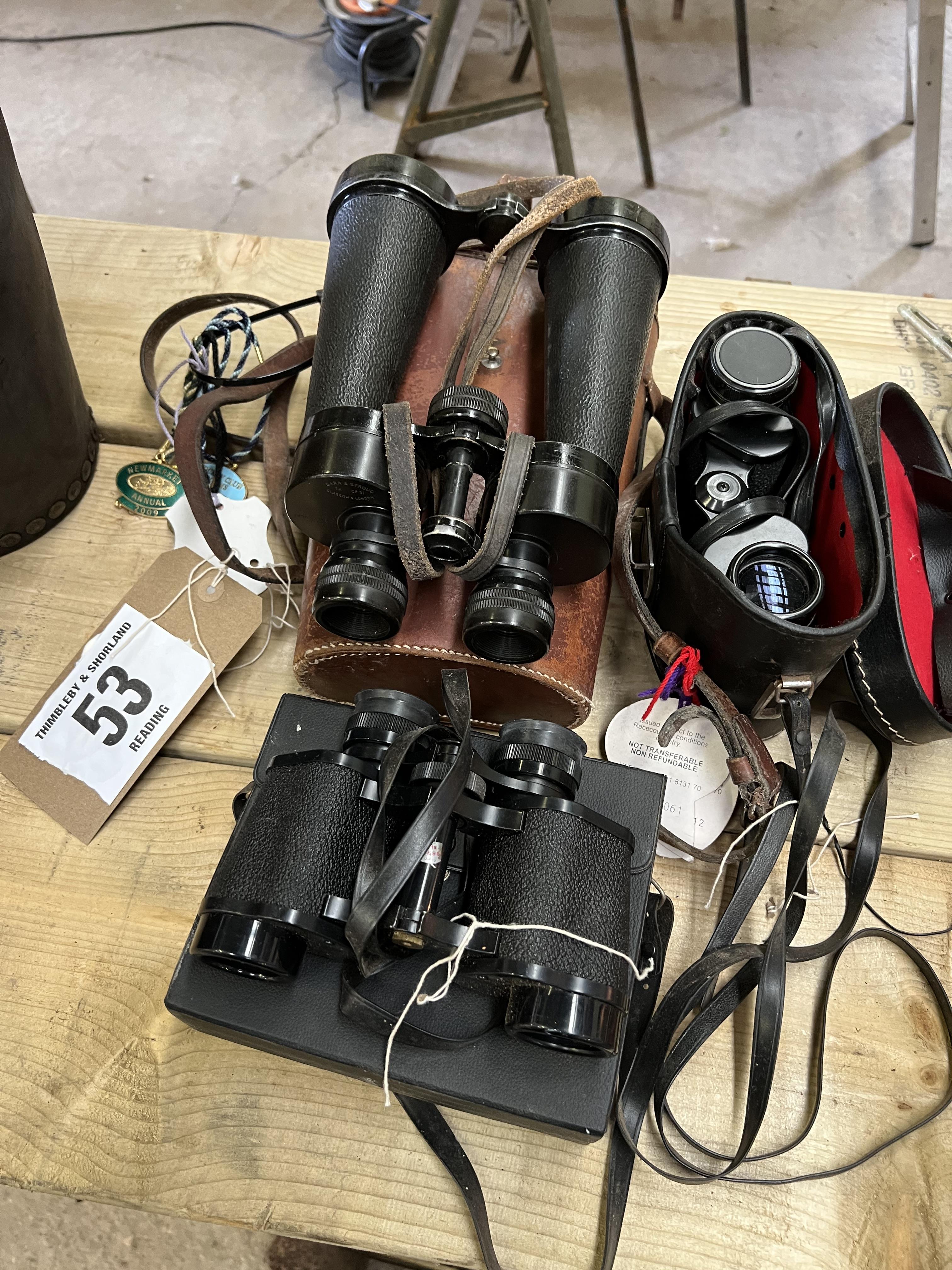 Three pairs of binoculars