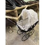 Child's pram with wicker basket body