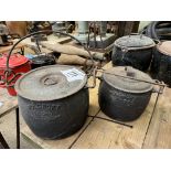 Two Holcroft cast iron lidded cooking pots