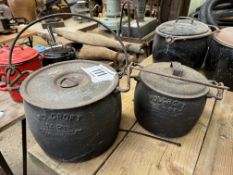 Two Holcroft cast iron lidded cooking pots