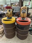 Two 40 gallon drums with fibreglass cartoon character heads. This lot carries VAT.