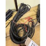 5 black plaited leather bull whips. This lot carries VAT.