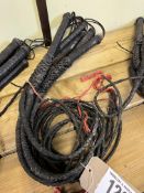 5 black plaited leather bull whips. This lot carries VAT.