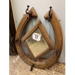 Horseshoe shaped wall mounted hat stand