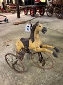 Child's pedal horse tricycle