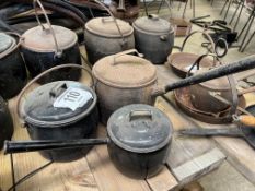 Two enamel lidded pots and a cast iron lidded saucepan