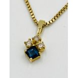 18ct gold pendant set with three diamonds on 14ct gold chain