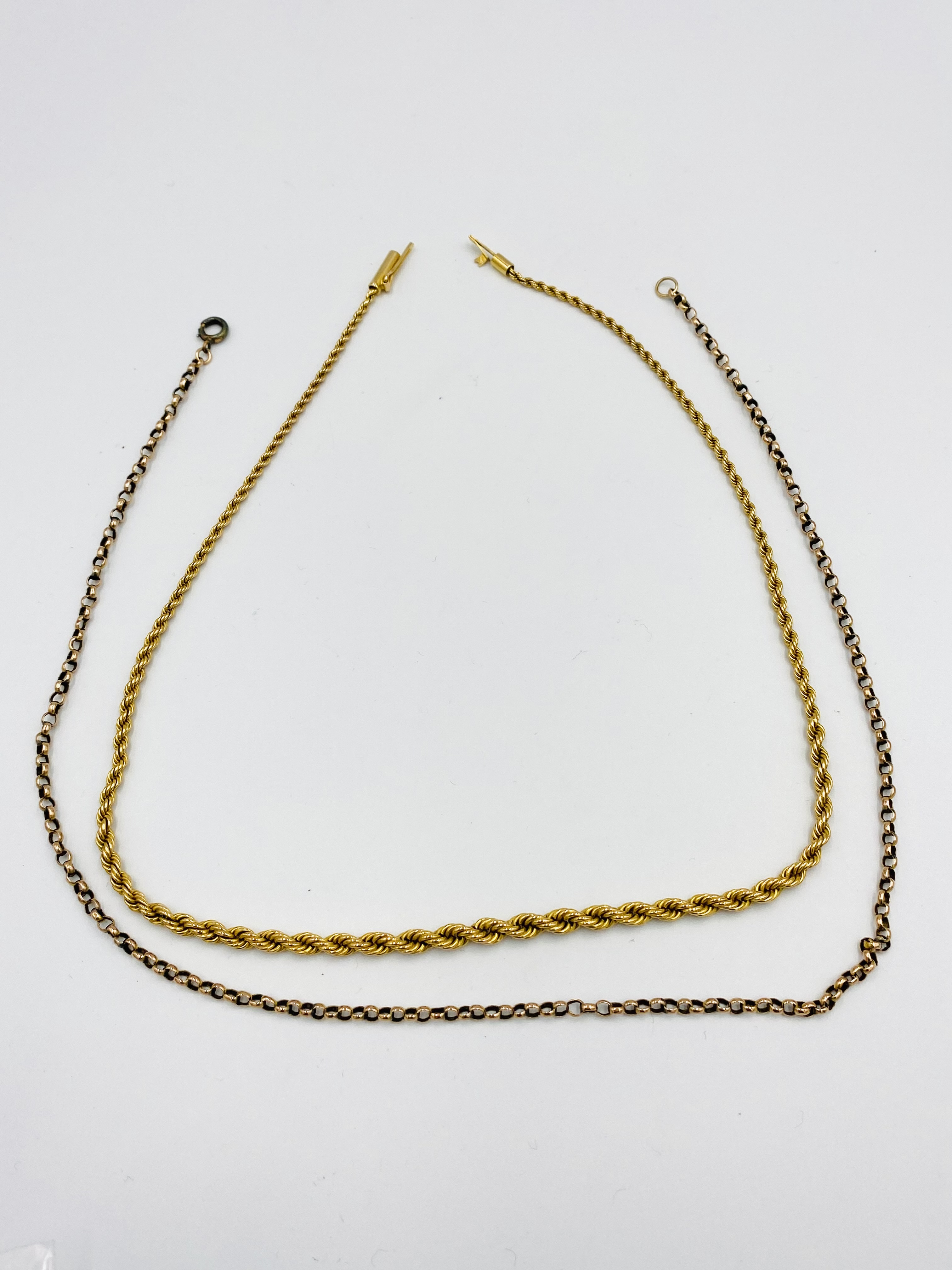 9ct gold link chain together with a gold plated rope twist chain