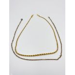9ct gold link chain together with a gold plated rope twist chain