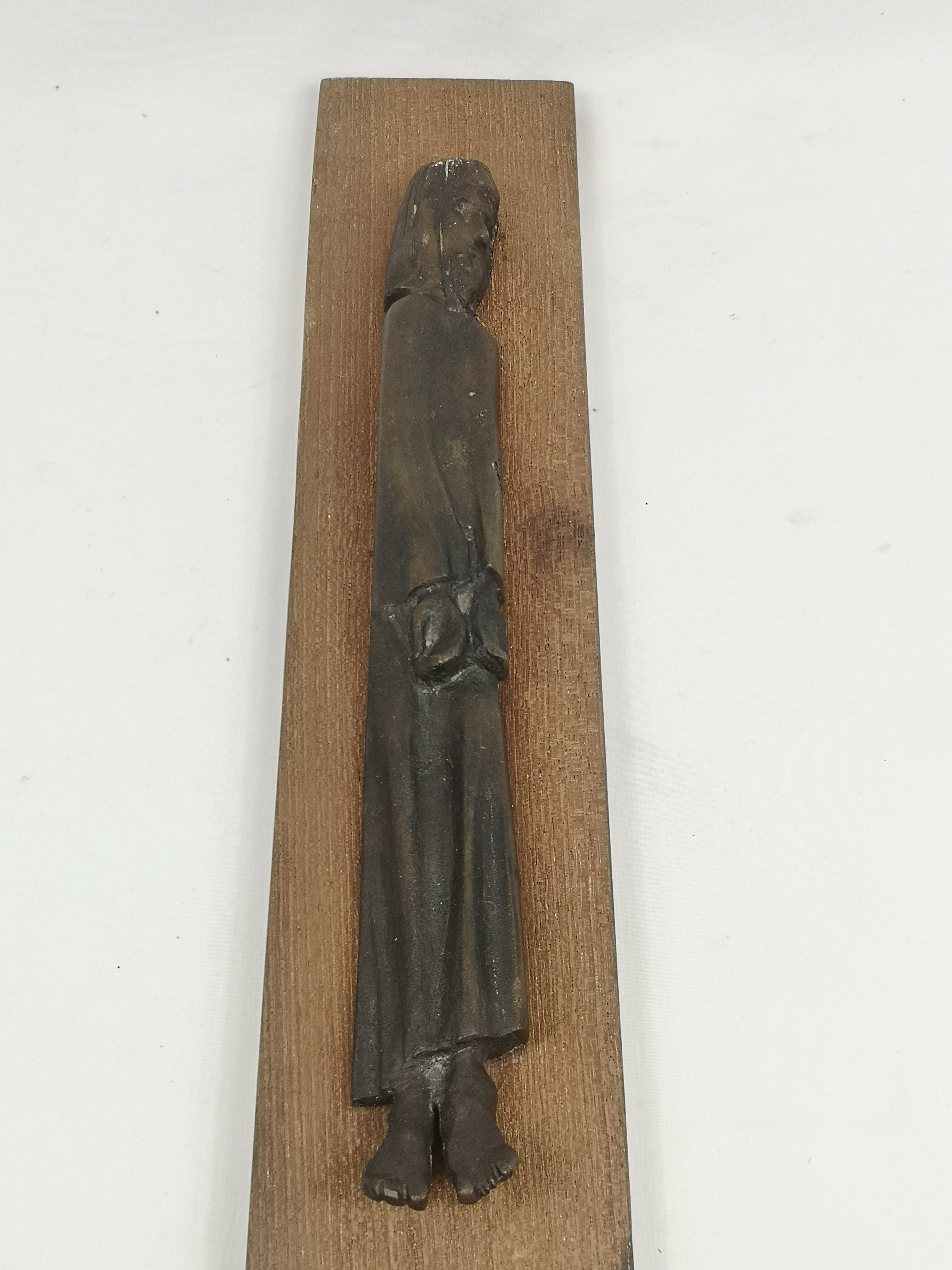 Bronze figure of Christ mounted on wood, stamped S. J. Lowcock