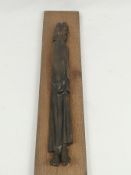 Bronze figure of Christ mounted on wood, stamped S. J. Lowcock