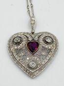 Edwardian white gold, ruby and diamond heart pendant with chain