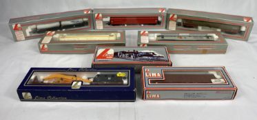 Eight Lima model railway wagons.