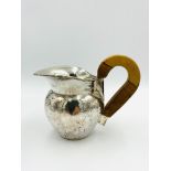 Hallmarked silver jug, London 1996