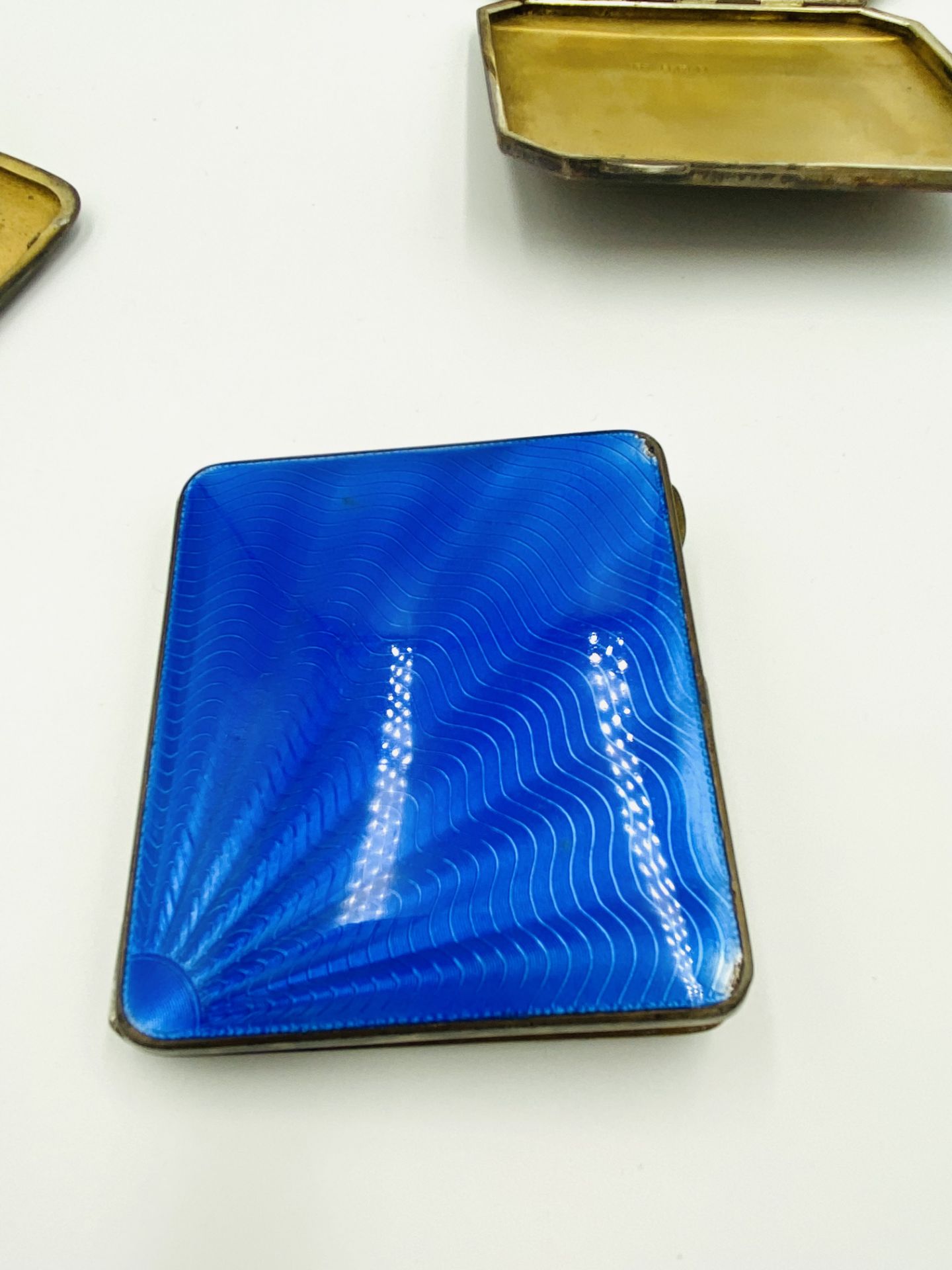 Three silver cigarette cases together with a brass cigarette case - Image 4 of 5