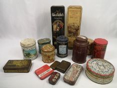 Approximately twenty biscuit and other tins