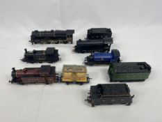 Two 00 gauge locomotives; three 00 gauge tenders and 00 gauge wagon.