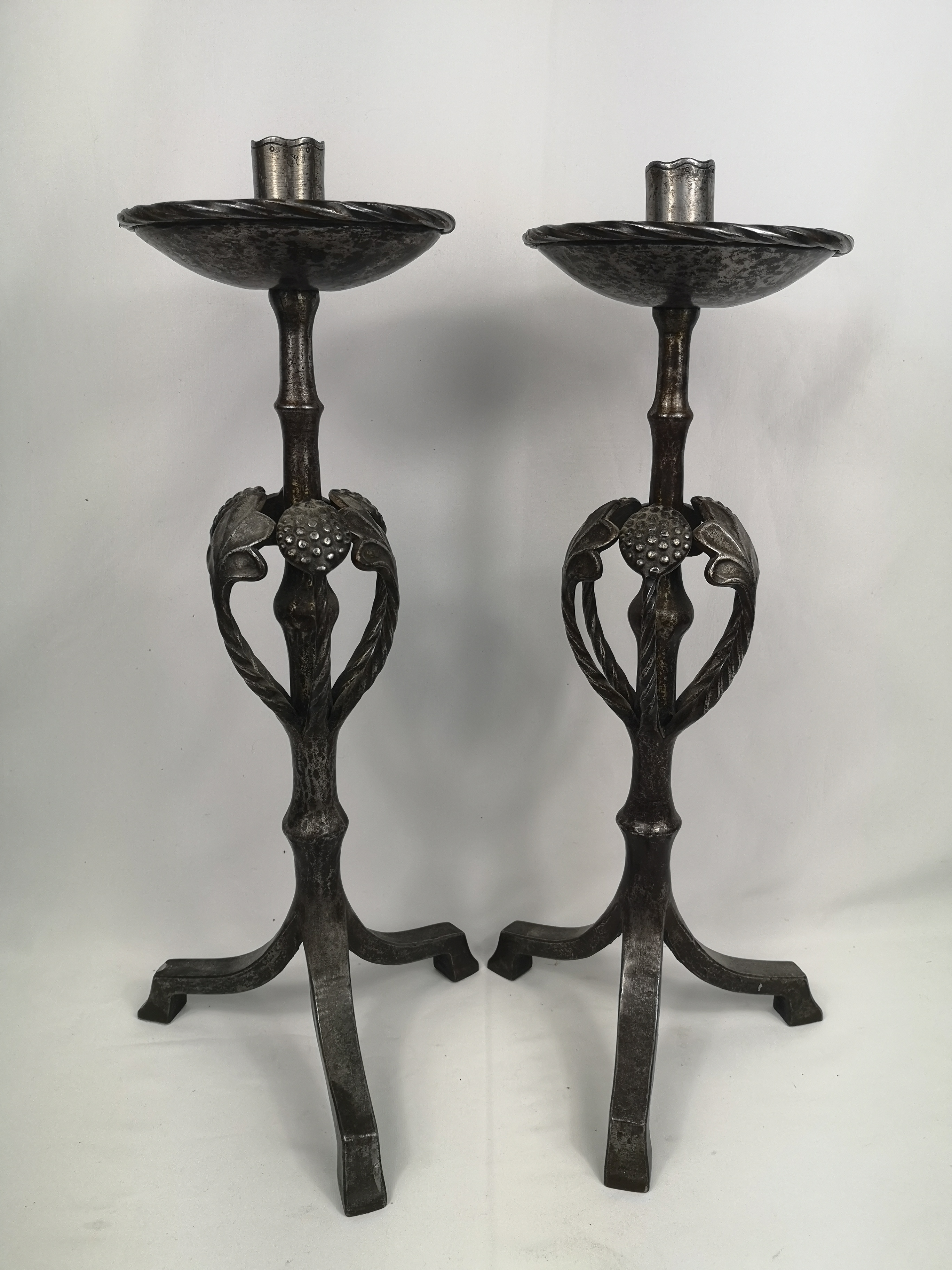Pair of steel church candlesticks