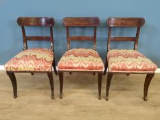 Three mahogany dining chairs