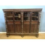 Carved oak bookcase