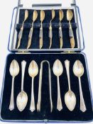 Boxed set of six silver spoons and sugar tongs