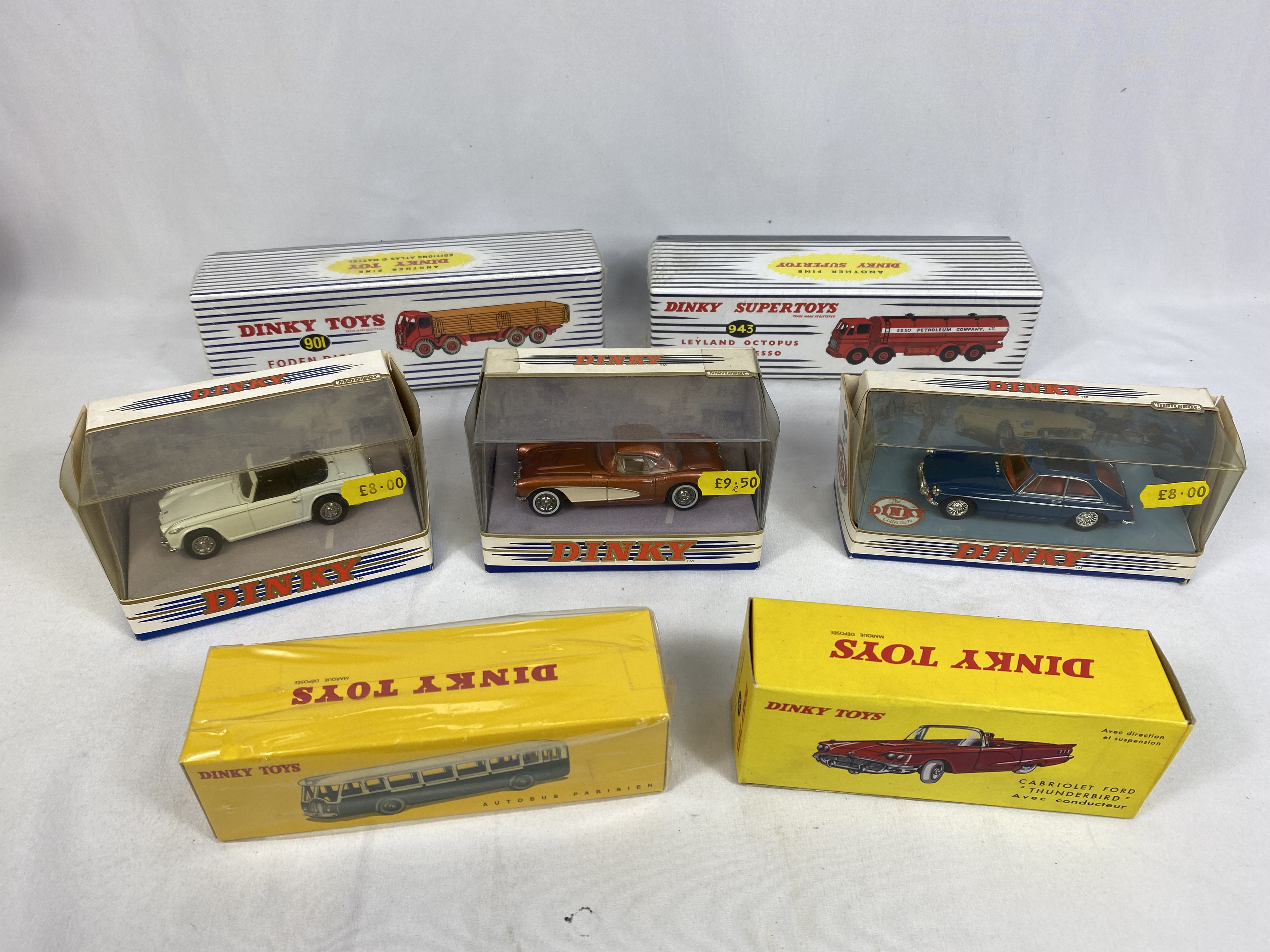 Seven Dinky toy vehicles in original packaging