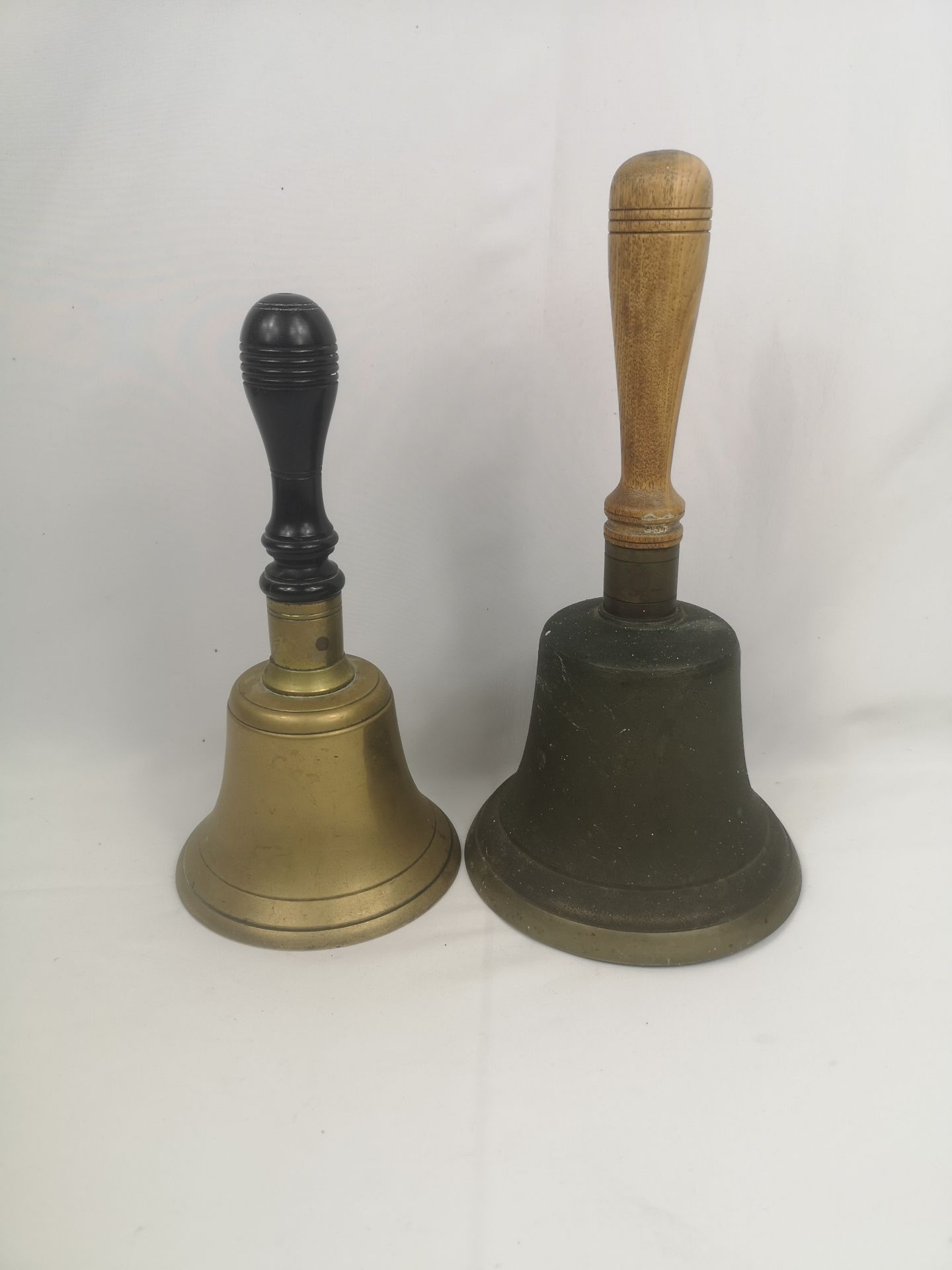 Two brass hand bells