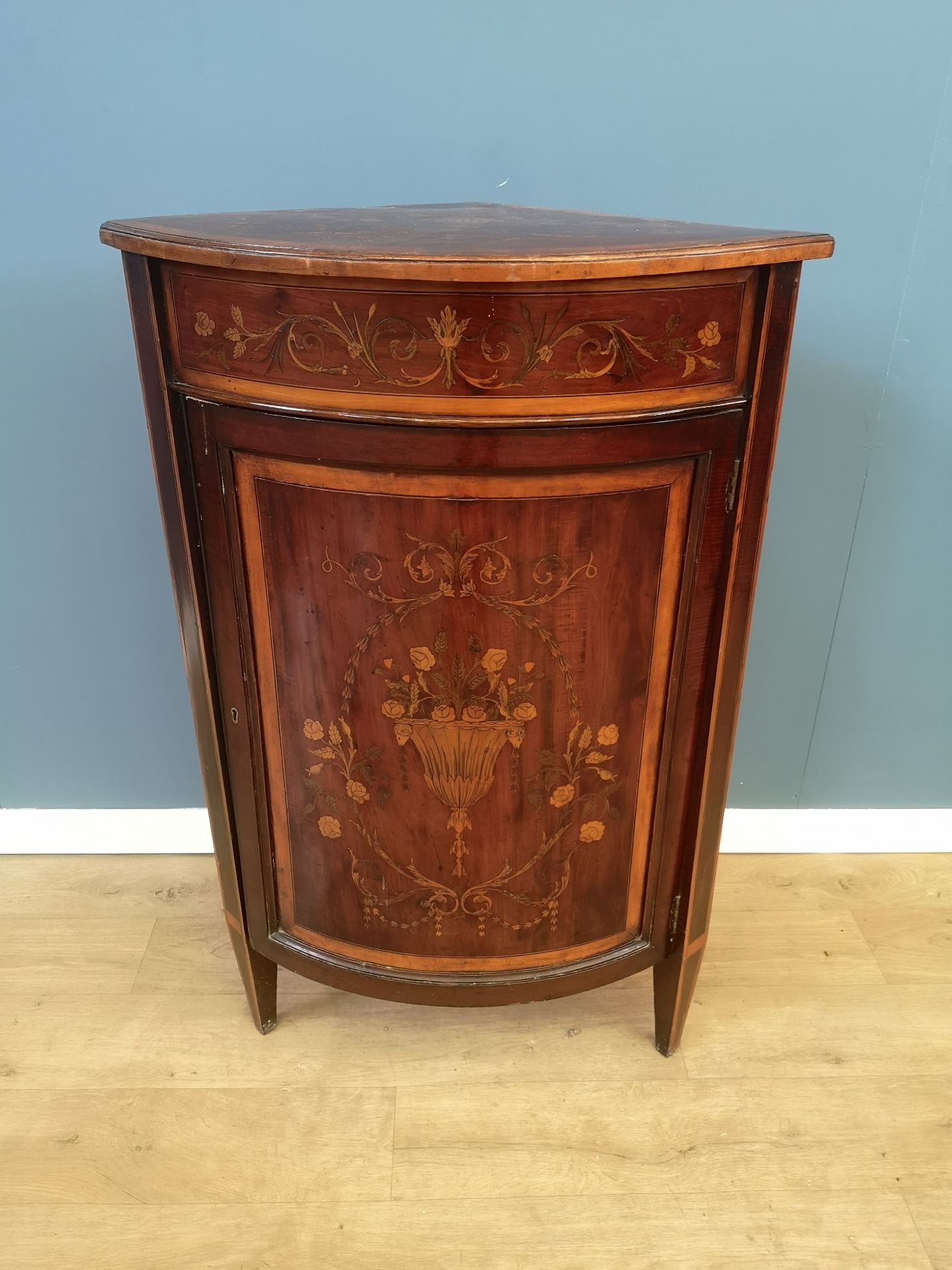 Mahogany bow fronted corner cabinet