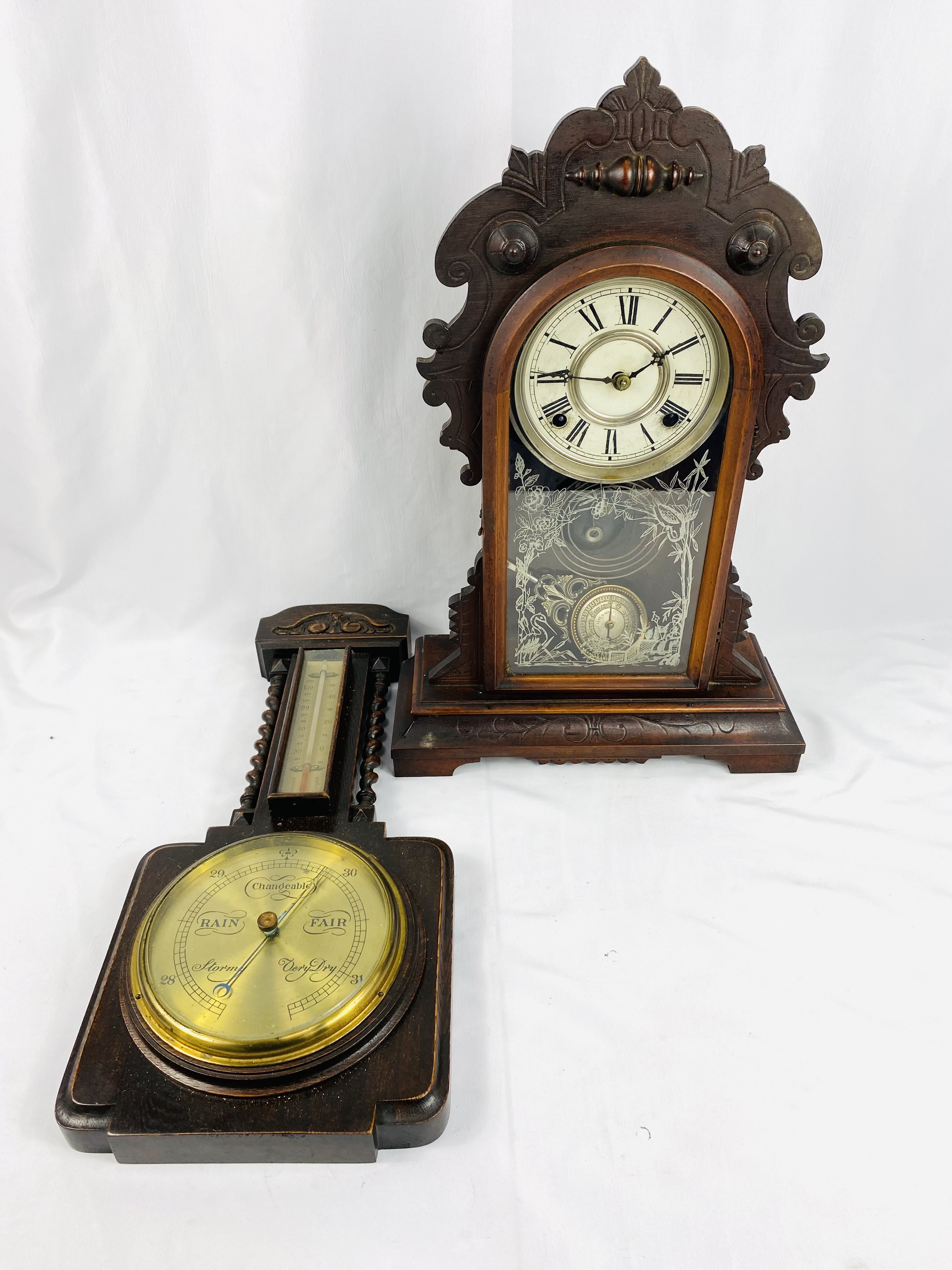 Wood cased mantel clock together with a wall mounted barometer