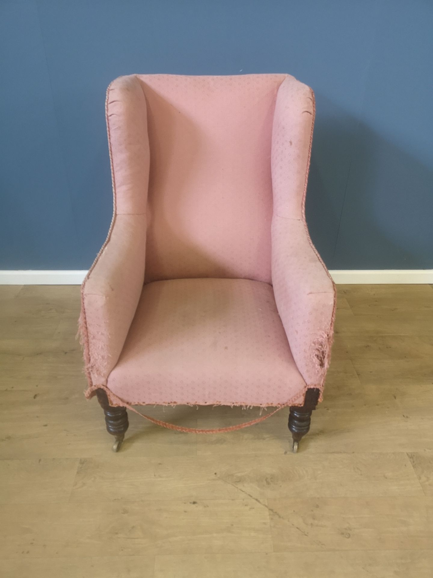 Upholstered wingback armchair