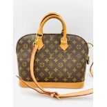 Louis Vuitton Alma handbag in monogram canvas