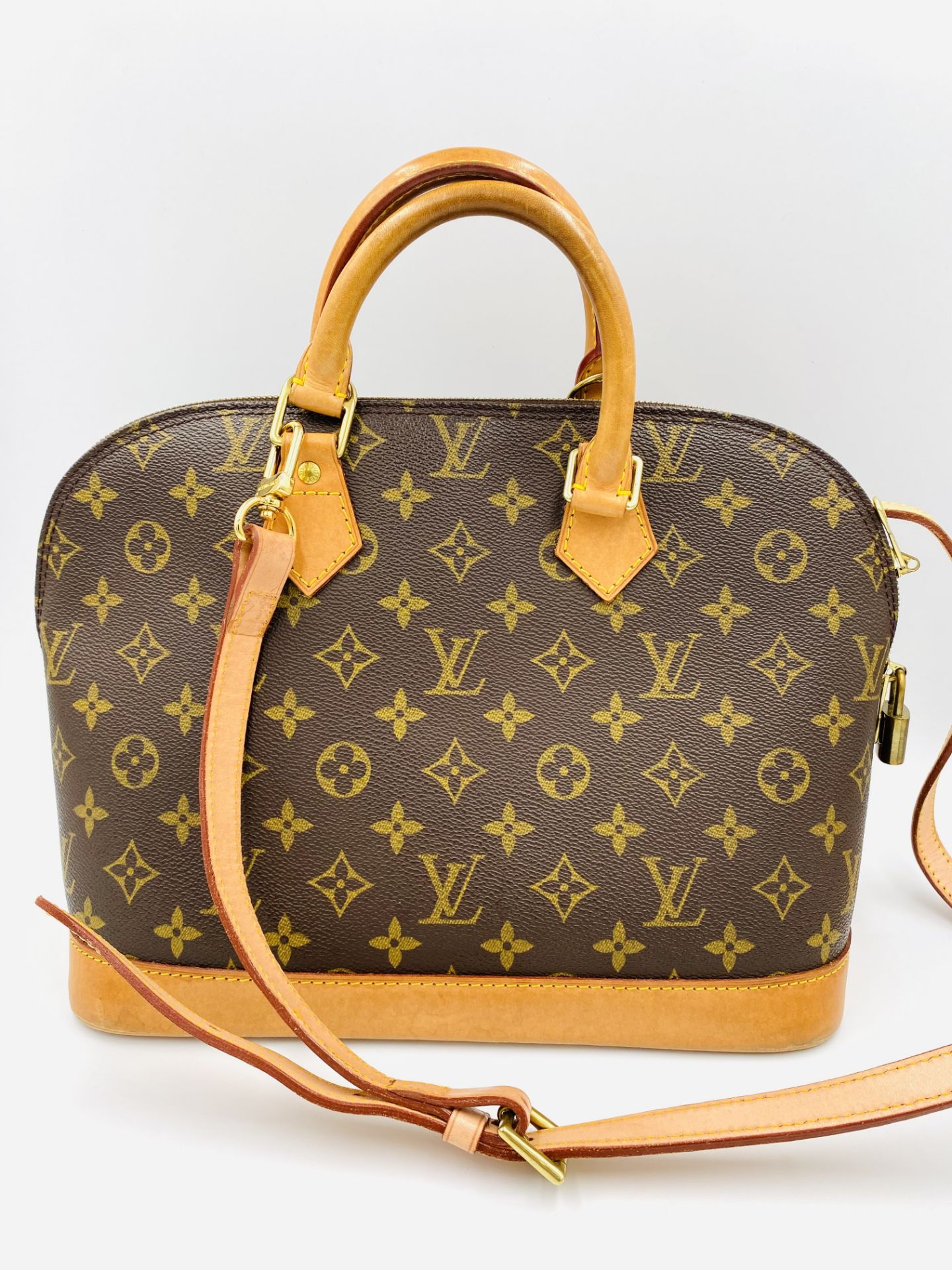 Louis Vuitton Alma handbag in monogram canvas
