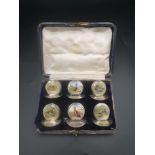 Boxed set of Edwardian silver menu card holders with hand painted birds by Sampson Mordan