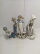 Lladro figure together with the Nao figures