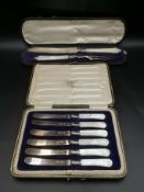 Box containing a silver and mother of pearl carving set; a box of silver and mother of pearl knives