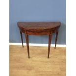 Edwardian mahogany demilune lift top card table