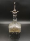 Continental glass decanter with silver top