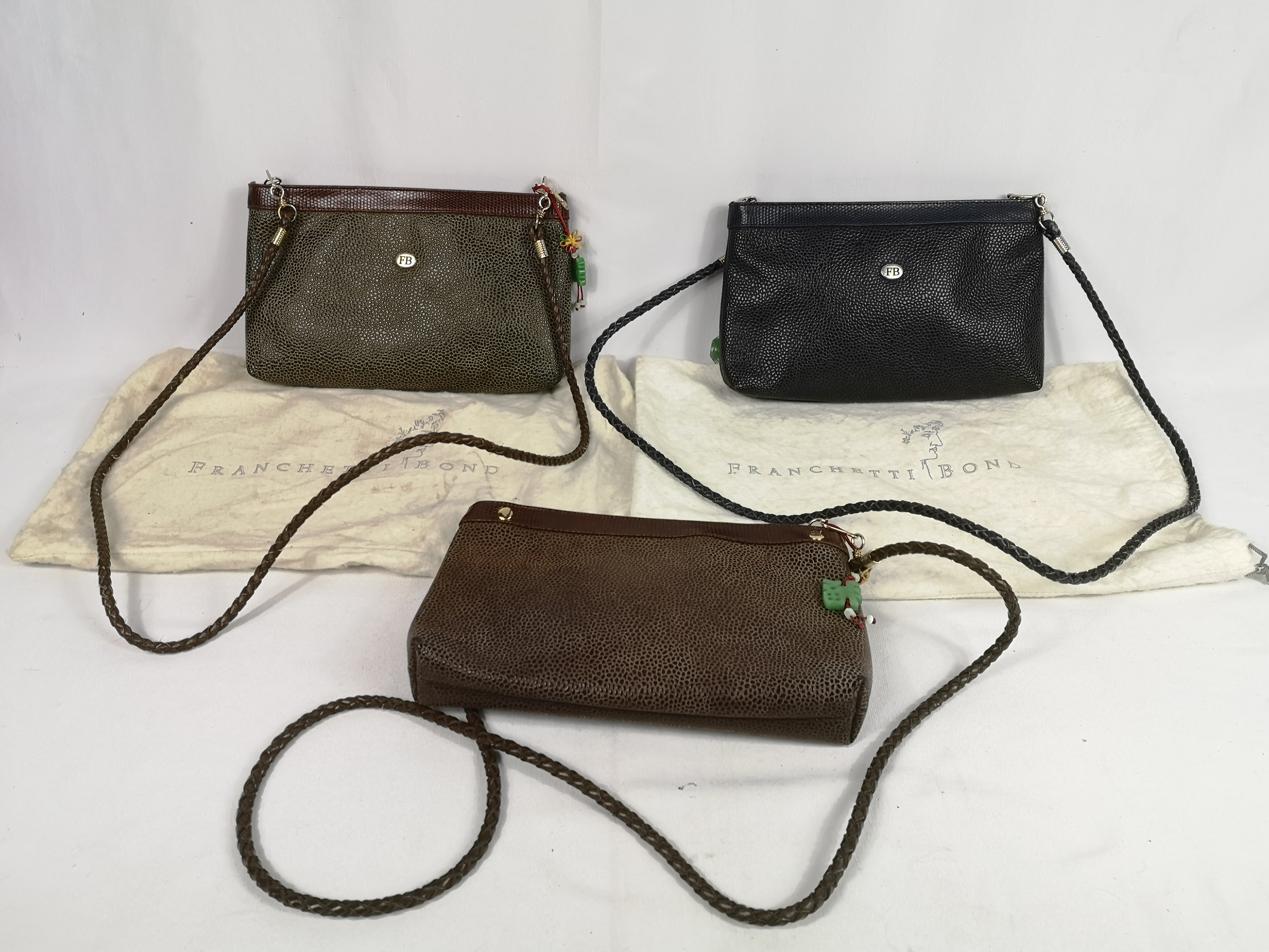 Two Franchetti Bond shoulder bags and one other