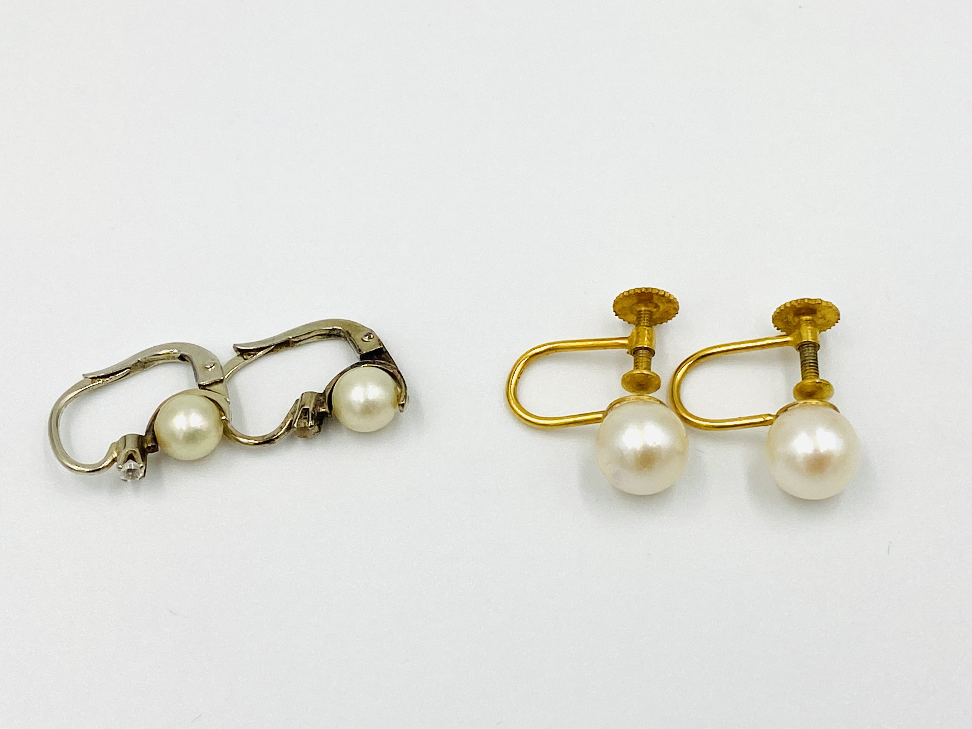 Pair of 9ct gold and pearl earrings; together a pair of white metal and pearl earrings. - Image 4 of 4