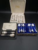 Box of silver tea spoons, a box of silver forks and a box with two silver spoons